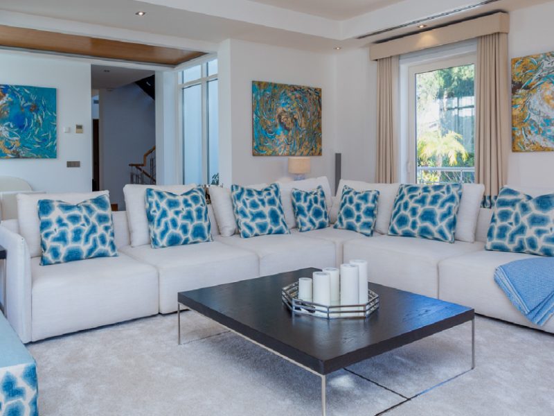 Blue and White Giraffe pattern print across luxury inteior design fabrics and sofas